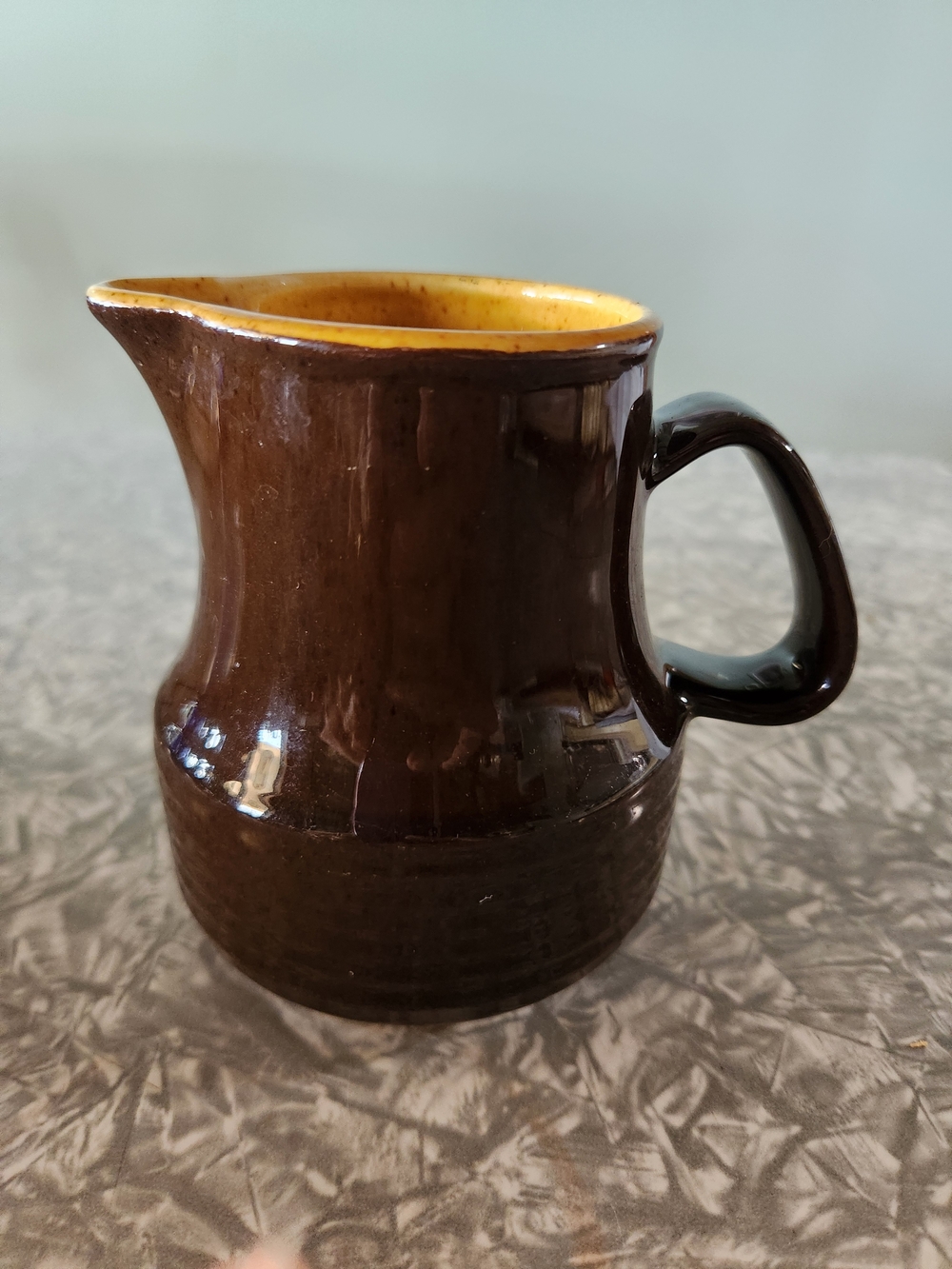 Source Unknown Brown Ceramic Pitcher with Yellow Interior